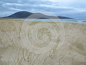 Beautiful shot of a grassy sandy beach in Harris, Outer Hebrides