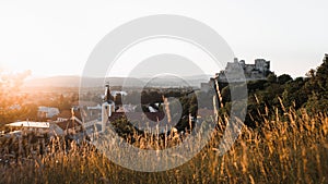 Beautiful shot of the historic Beckov Castle on a rural valley at sunset in Slovakia