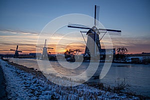 Beautiful shot of the Kinderdijk Windmills at sunset in the Netherlands