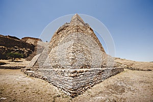 Beautiful shot of the La Quemada Zacatecas pyramid with a blue sky in the background