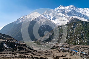 Beautiful shot of Lower Pisang village and Annapurna II mountain, Annapurna circuit trek, Nepal