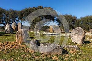 Beautiful shot of the megalithic stone circle in Vale Maria do Meio Cromlech in Evora, Portugal photo