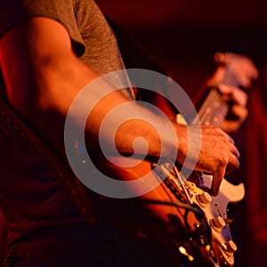 Beautiful shot of a musician playing guitar