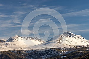 Beautiful shot of the natural scenery around the mountain range in More og Romsdal, Norway