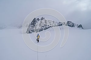 Beautiful shot of a person doing alpine climbing in the Mont Blanc Massif mountain in France