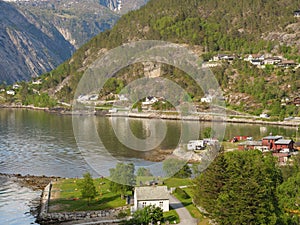 Beautiful shot of rocky cliffs on the shore in Fjord, Norway