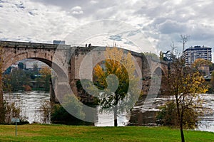 Beautiful shot of the Roman bridge over the River Mio in the city of Ourense in Galicia, Spain