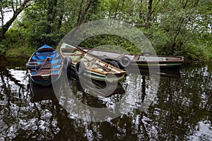 Beautiful shot of rowling boats parked in the Lough Cullin near Pontoon, County Mayo in Ireland