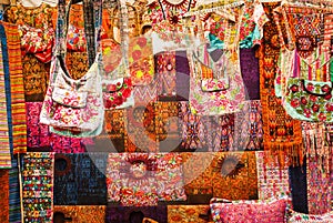 Beautiful shot of rugs and bags in Chichicastenango market photo