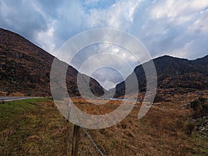 Beautiful shot of rural land near mountains in the countryside of Ireland