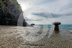 Beautiful shot of a scenic seashore near a cliff in Vernazza, Cinque Terre, italy