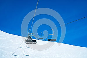 Beautiful shot of ski lifts and cable cars in Saalbach ski resort during winter time