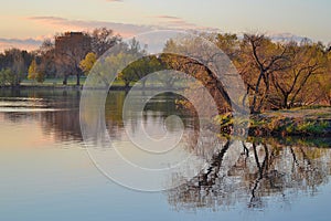 Beautiful shot of the Sloan lake in the autumn with park in the background