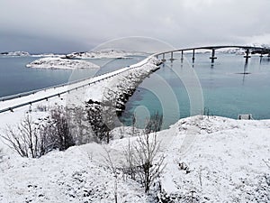 Beautiful shot of the snowy Sommaroy Bridge connecting the islands of Kvaloya and Sommaroy