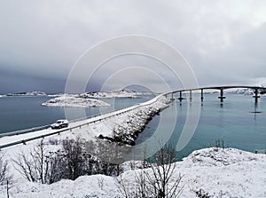 Beautiful shot of the snowy Sommaroy Bridge connecting the islands of Kvaloya and Sommaroy