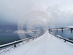 Beautiful shot of the snowy Sommaroy Bridge connecting the islands of Kvaloya and Sommaroy