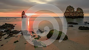 Beautiful shot of sunset at the rocky beach