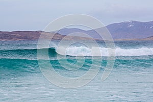 Beautiful shot of waves washing up the shore in Harris, Outer Hebrides