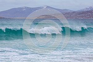 Beautiful shot of waves washing up the shore in Harris, Outer Hebrides