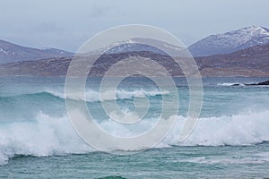 Beautiful shot of waves washing up the shore in Harris, Outer Hebrides