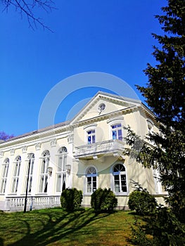 Beautiful shot of a white building in Spa Park in Jelenia GÃ³ra, Poland.
