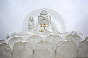 Beautiful shot of the white religious Guan Yim statue in Thailand photo
