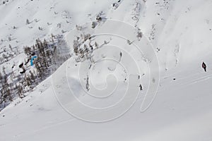 Beautiful shot of the winter sport of kite skiing on Simplon Pass, Switzerland