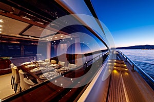 Beautiful shot from the yacht under a dark blue sky at night time