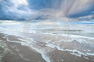 Beautiful showery sky over North sea photo