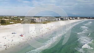 Beautiful Siesta Key beach on a sunny day. Drone Fly view over beach in Siesta Key, Florida.