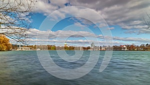 Beautiful silhouette of evening Hanover and huge artificial lake Maschsee. Germany. 4K time lapse.