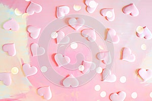 Beautiful silk pink hearts on a pink background. Holiday concept Valentine`s Day. Flat lay.