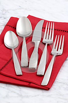 Beautiful silverware on fine napkin