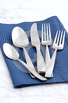 Beautiful silverware on fine napkin