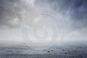 Beautiful simple gravel background with mist and clouds