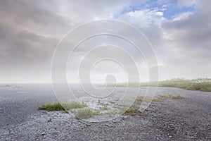 Beautiful simple gravel background with mist and clouds