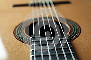 Beautiful six - string classic guitar as background