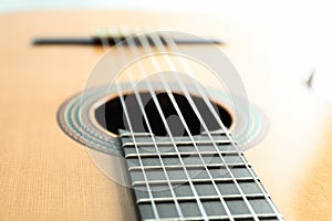 Beautiful six - string classic guitar on white background