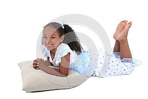 Beautiful Six Year Old Girl In Pajamas Over White photo