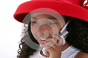 Beautiful Six Year Old Girl In Red Hat With Cellphone