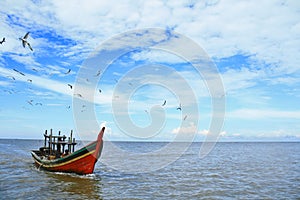 The beautiful sky with boat in the high seas