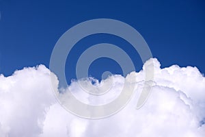 Beautiful sky landscape with dense white clouds on blue