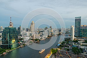 Beautiful skyline along Chao Phraya River in Bangkok at dusk