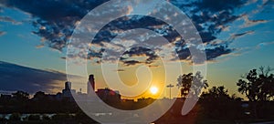 Dramatic Sunset with beautiful skyline over downtown Omaha Nebraska