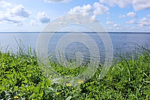 Beautiful skyscape on big lake in national park with sparkling water and marvelous clouds