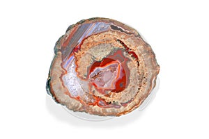 Beautiful slice of agate geode with shades of colors ranging from red to orange through purple