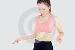 Beautiful slim young asian woman measuring tape thin waist wear uniform fitness isolated white background