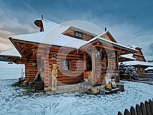 Stylish wooden cottage for a holiday in the evening light