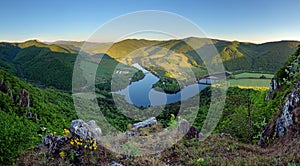 Beautiful Slovakian panoramic landscape with a rock and river do