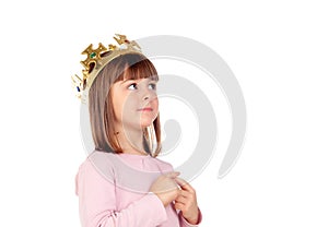 Beautiful small girl with golden crown of princess